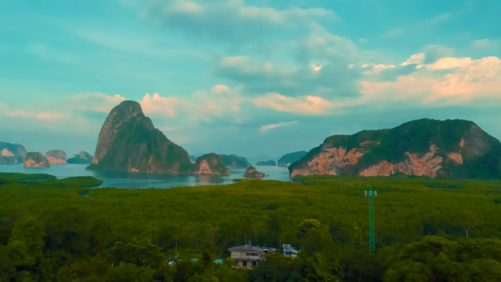 Aerial view across Phang Nga Bay limestone islands and mangroves.